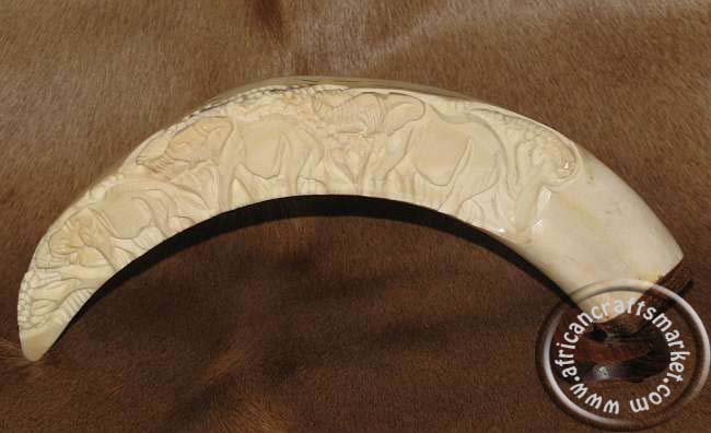 African carved warthog tusk - elephants