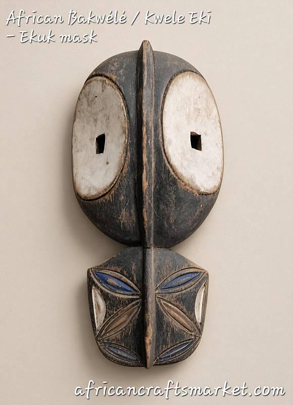 Hand carved Bakwele Kwele Eki Ekuk mask from Central Africa