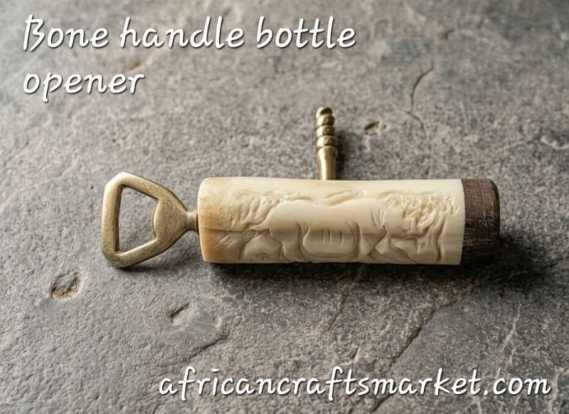 A luxury African bar tool featuring a polished, hand-carved animal bone handle integrating both a bottle opener and a functional steel corkscrew