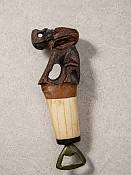 Labeled African bone and wooden  Elephant bottle opener