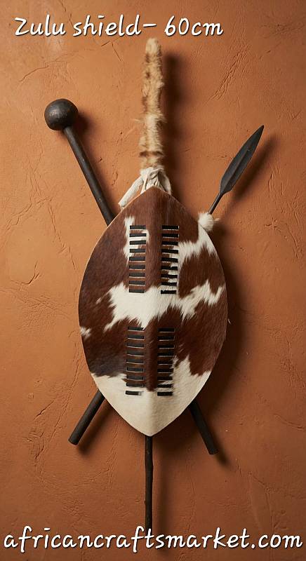 Large 60cm authentic Zulu shield handcrafted from genuine multi-colored African cattle hide in KwaZulu-Natal, South Africa