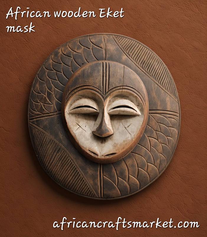 Hand carved Eket Sun mask from Nigeria