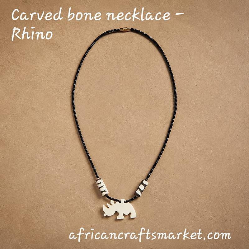 African hand-carved cow bone rhino pendant necklace