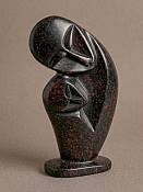Handcrafted African soapstone carving of an abstract family silhouette, authentic cultural folk art home accent