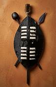Authentic Nguni Cowhide 35cm Zulu Shield Small 35cm Zulu shield made from dark patterned Nguni cowhide, traditional African art piece sourced near Durban