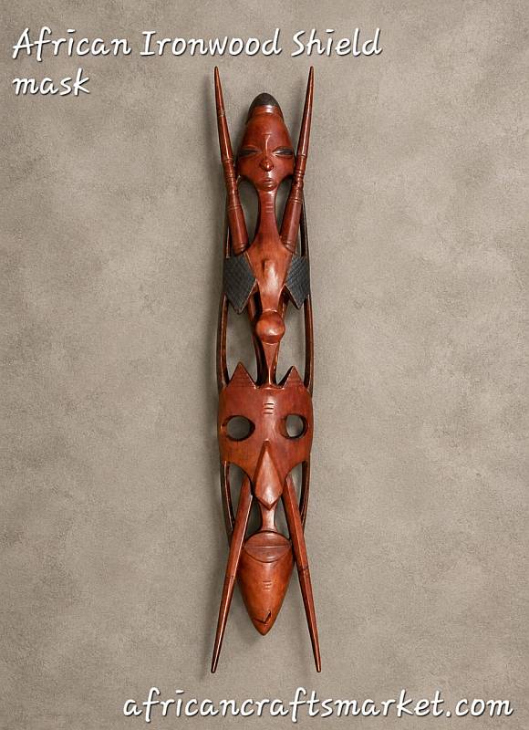 75 cm African Shona ironwood shield mask from Zimbabwe with two carved removable shafts