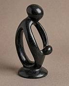 Minimalist abstract soapstone statue of a father and son, handcrafted African folk art for global home decor