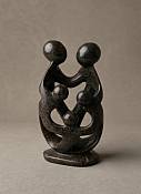Shona-style inspired abstract parents and three children stone statue, symbolizing unity, love, and protection