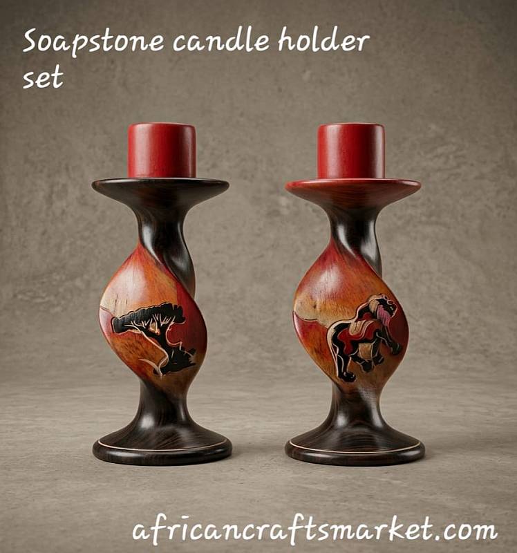 Pair of African soapstone twisted candlesticks hand-dyed in warm sunset tones with etched silhouettes of a lion and an acacia tree