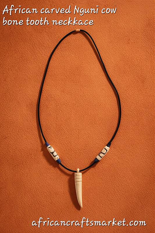 Handcrafted white African bone tooth pendant necklace on beaded cord