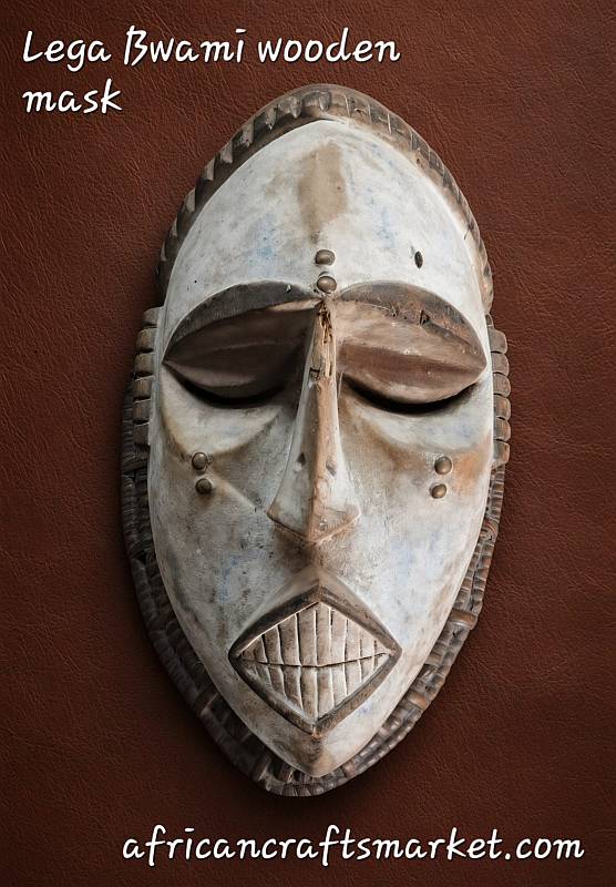 Carved wooden Lega Bwami mask from the Democratic Republic of the Congo