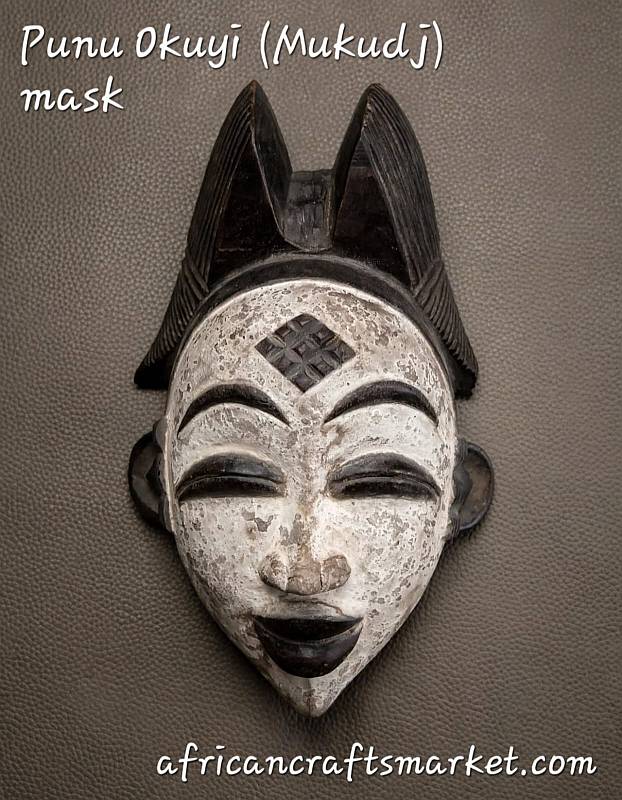 Traditional Gabonese Punu Okuyi white painted wooden ceremonial mask