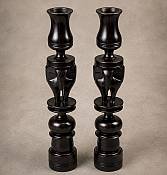 Ebony Elephant Carving Candlesticks Close-up view of the intricate hand-carved elephant details, revealing the rich grain of authentic black ebony timber
