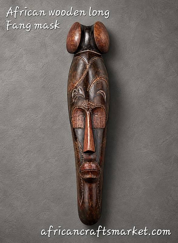 Long bronze-coloured Fang wooden mask from Gabon