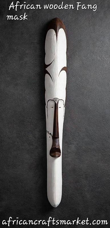 Long white Fang wooden mask with elongated African face design