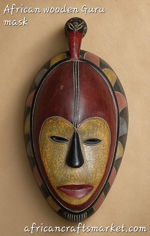 uro mask from Ivory Coast – elegant African tribal wooden mask with bird crest and geometric patterns