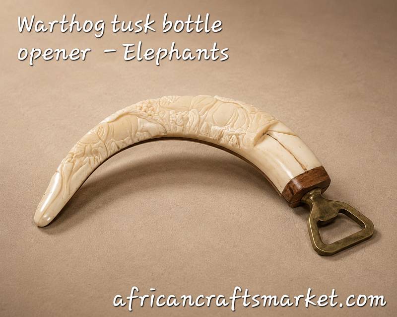 Warthog tusks bottle openers A genuine African warthog tusk bottle opener featuring an intricate, hand-carved 3D relief sculpture of a majestic African elephant along the polished ivory handle.