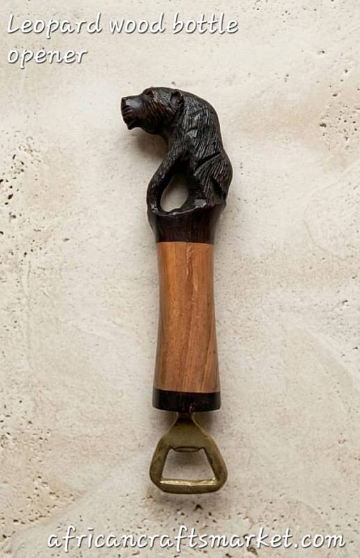 A selection of handcarved wooden leopard bottle openers arranged at our export warehouse, packed and ready for international shipping