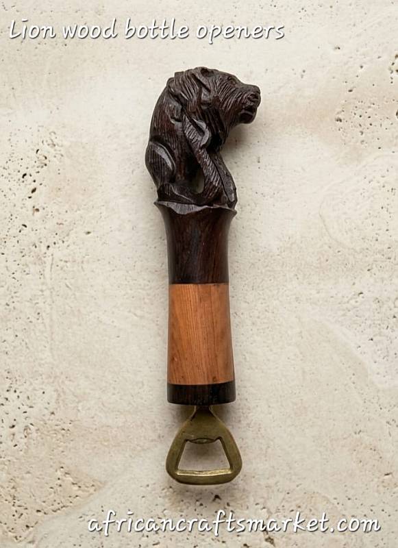 A handcrafted African lionwooden bottle opener expertly carved into the shape of a lion, featuring detailed hand-painted spots and a durable metal opener base