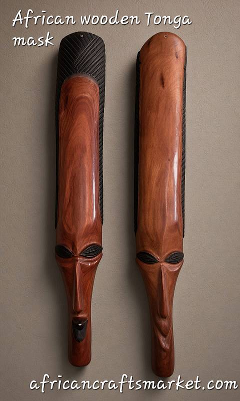Long traditional Zimbabwean Shona ironwood tribal mask pair sized 55 to 60cm